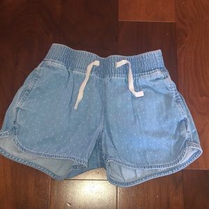 Kids shorts with a white dots.